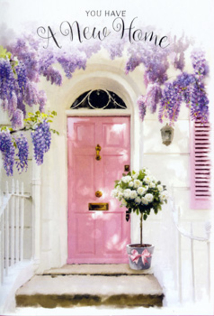 The image captures a tranquil doorway in Bexley turned into a poetic welcome, where colour, scent, and texture come together with effortless grace. A softly painted pink front door, its surface smooth and luminous, stands at the centre, framed by whitewashed walls that feel cool and calm, like shaded terraces on a summer afternoon. Overhead, generous strands of wisteria trail down in loose, lavender cascades, their pea-like blossoms clustered along slender stems, creating a dreamy arch that echoes the gentle character of Bexley's tree-lined avenues. At the base of this pastel composition, set carefully on the doorstep, a chic grey metal bucket cradles a lush mass of creamy white roses. The roses are tightly petalled and full, opening in layered spirals that seem to glow against the softer backdrop. Threaded between them, soft green foliage peeks out, giving the arrangement movement and a touch of garden freshness, as if it were just cut from a local Bexley garden. A pale pink ribbon is tied around the bucket, its satin bow adding a hint of celebration without overwhelming the simplicity of the scene. The light is gentle, suggesting a late afternoon or early evening when the neighbourhood grows quiet and birdsong replaces traffic. Emotionally, the arrangement feels like a heartfelt congratulations-a housewarming tribute for someone settling into a new address near Bexley Village or by Danson Lake. It speaks of comfort, security, and the tender hope that a thoughtfully decorated doorstep can bring, making the new house feel instantly more like home.